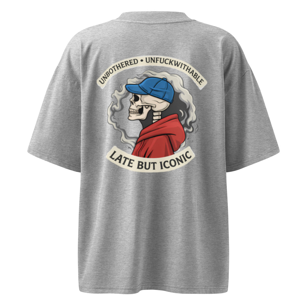 Light grey oversized T-shirt featuring large back print with retro illustration and bold typography, unisex streetwear style.