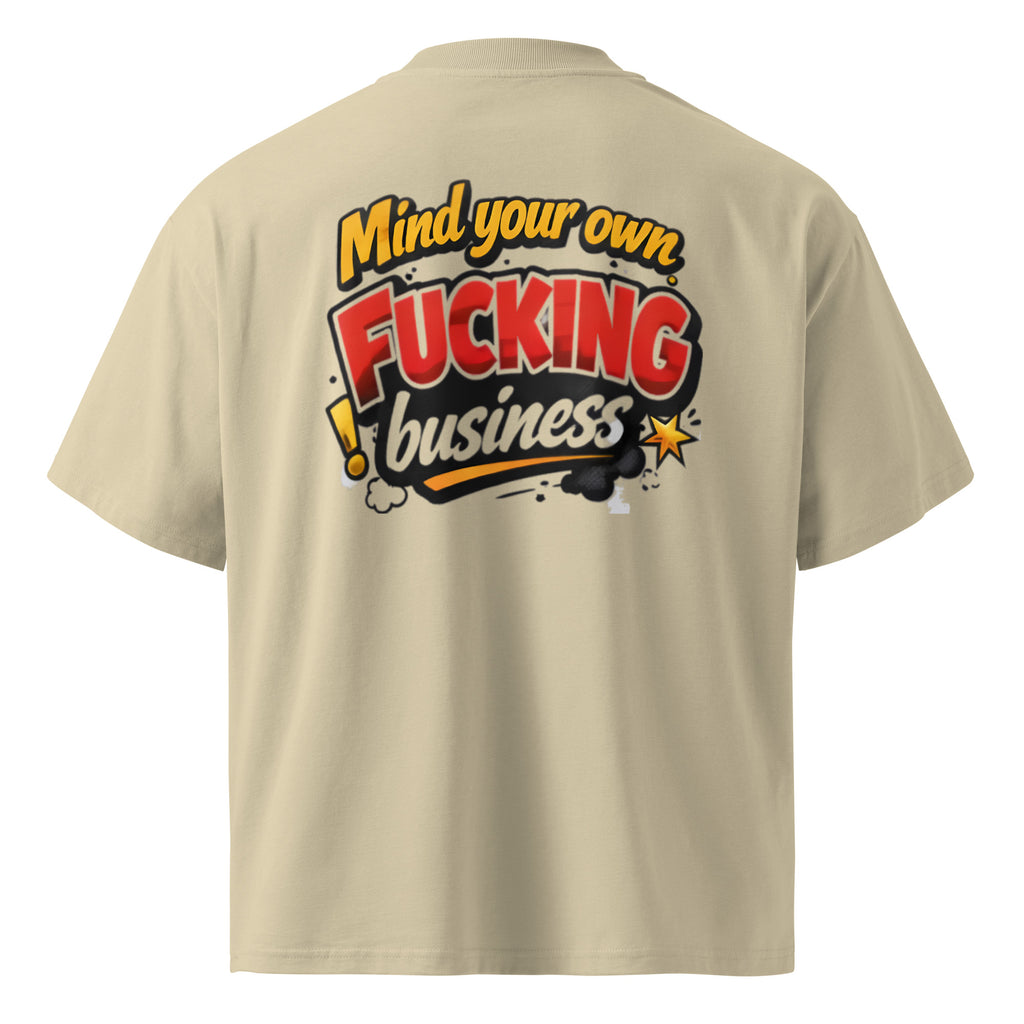 Beige streetwear t-shirt featuring large “Mind your own fucking business” graffiti style back print, rear view mockup.