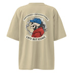 Beige oversized graphic T-shirt with large back print featuring vintage-style illustration and bold typography, streetwear unisex design.