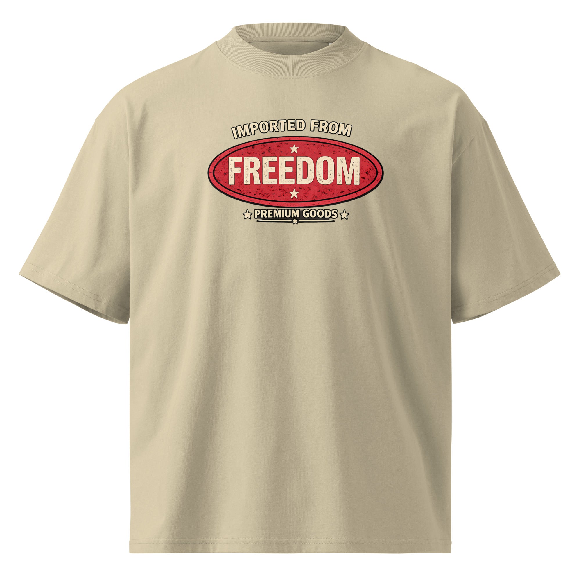 Beige graphic t-shirt front view with vintage red “Imported from Freedom – Premium Goods” chest logo, retro streetwear typography print, unisex casual tee.