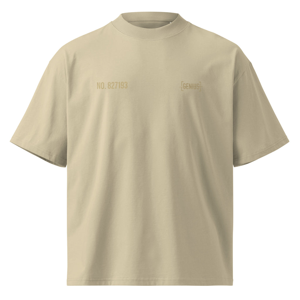 Beige oversized streetwear T-shirt with subtle gold chest lettering and premium minimal aesthetic