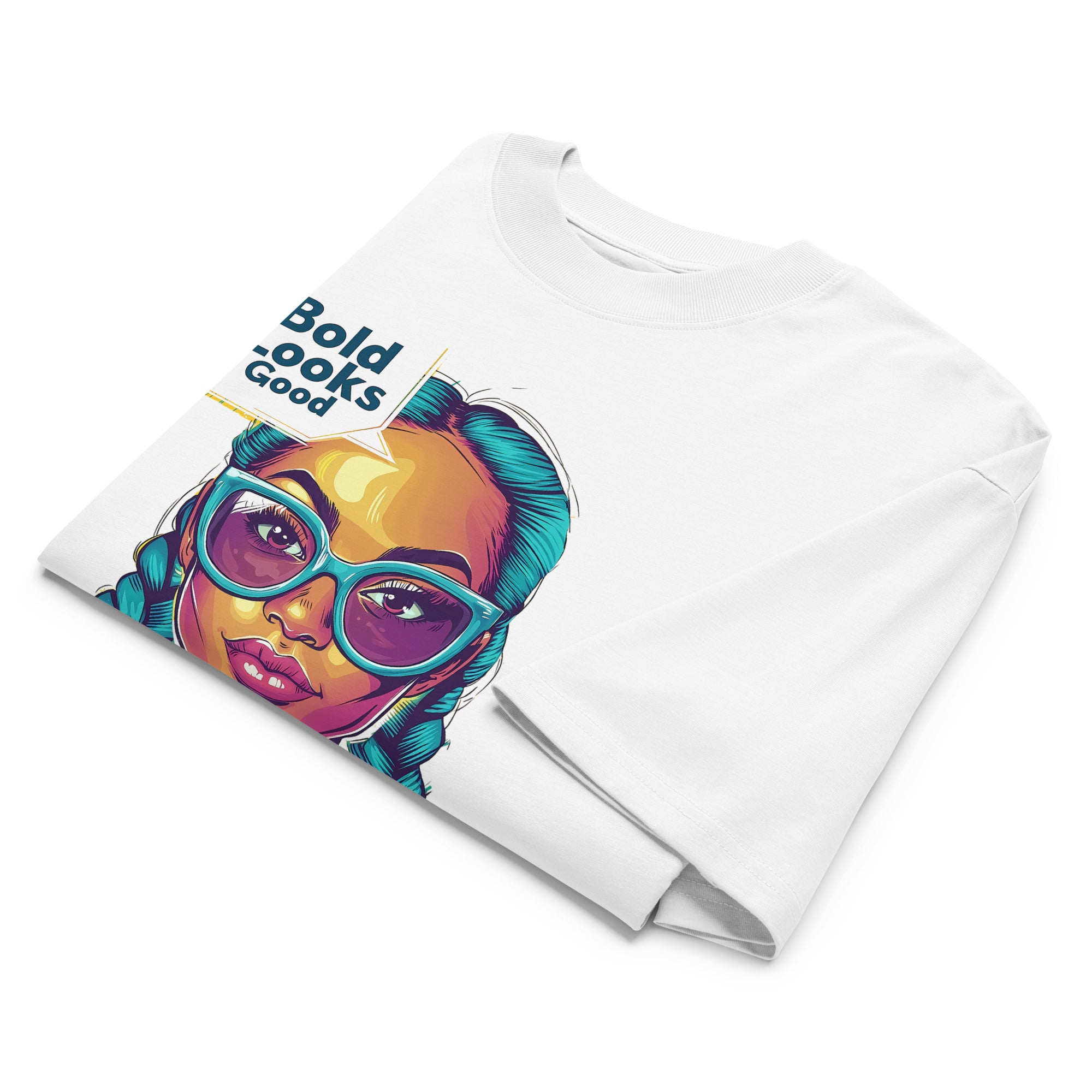 Folded white streetwear t-shirt displaying colorful pop art portrait design, angled studio product mockup.