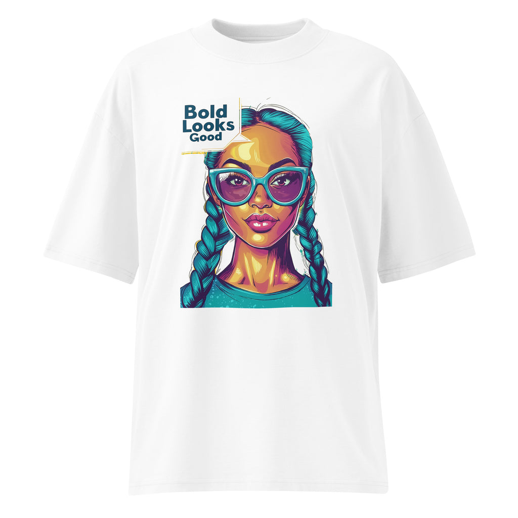 White graphic t-shirt flat lay showing vibrant pop art female portrait print with bright neon colors and bold streetwear aesthetic.