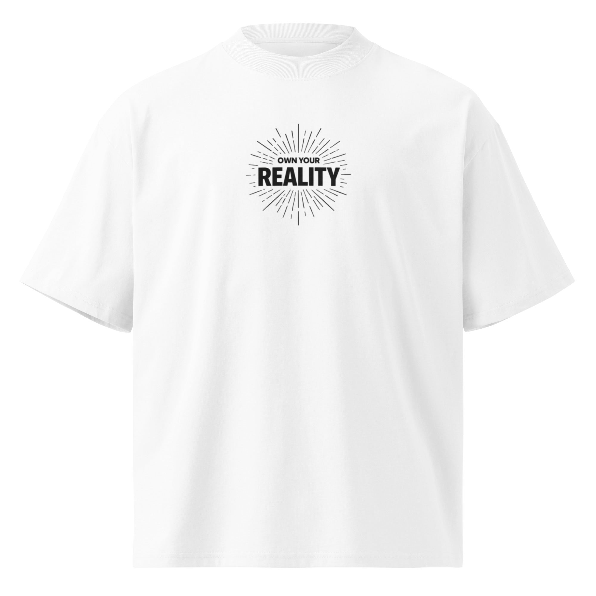White oversized t-shirt front view with “Own Your Reality” minimal chest graphic and sunburst design, clean mockup