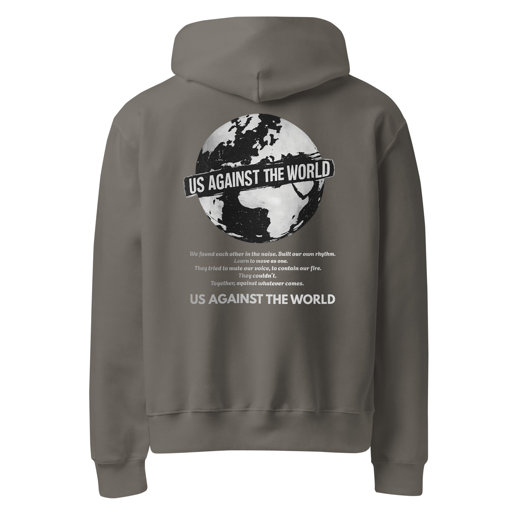 Grey unisex hoodie featuring “Us Against the World” world map graphic on the back, urban streetwear style