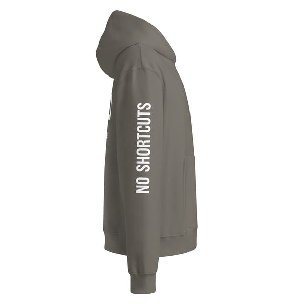 Asphalt unisex oversized streetwear hoodie side view with “No Shortcuts” sleeve print.