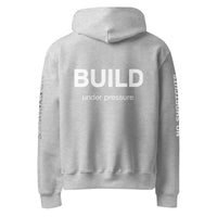 Athletic heather unisex oversized hoodie with “Build Under Pressure” statement printed on back, streetwear hoodie back view.