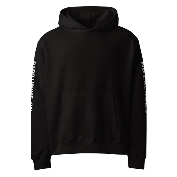 Black unisex oversized streetwear hoodie front view with minimalist design and printed sleeves.