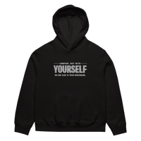 unisex streetwear hoodie front view with “compare just with yourself” motivational quote print
