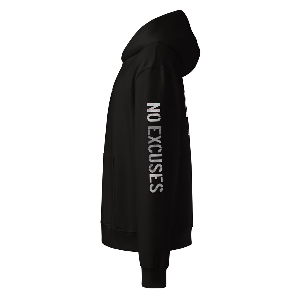 Black hoodie showing sleeve slogan print, left side view – urban streetwear style by Noiré.
