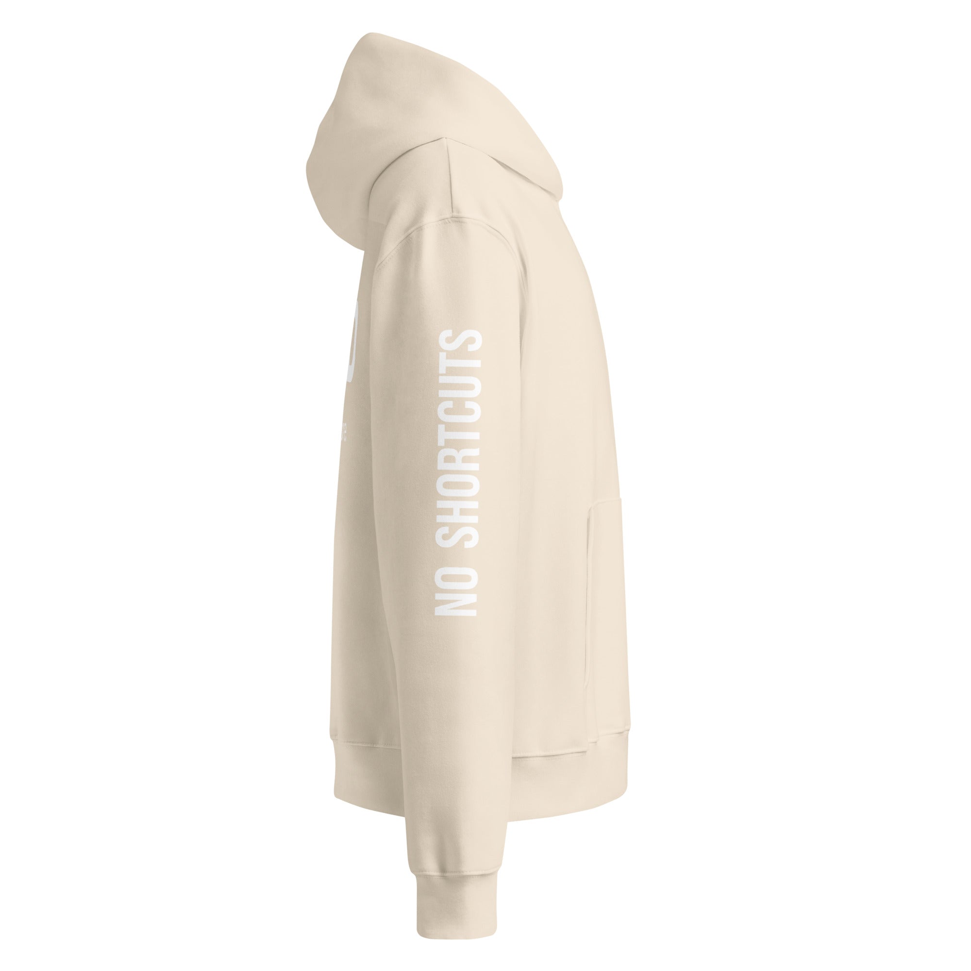 Beige hoodie with vertical sleeve typography, side view – premium streetwear style by Noiré.