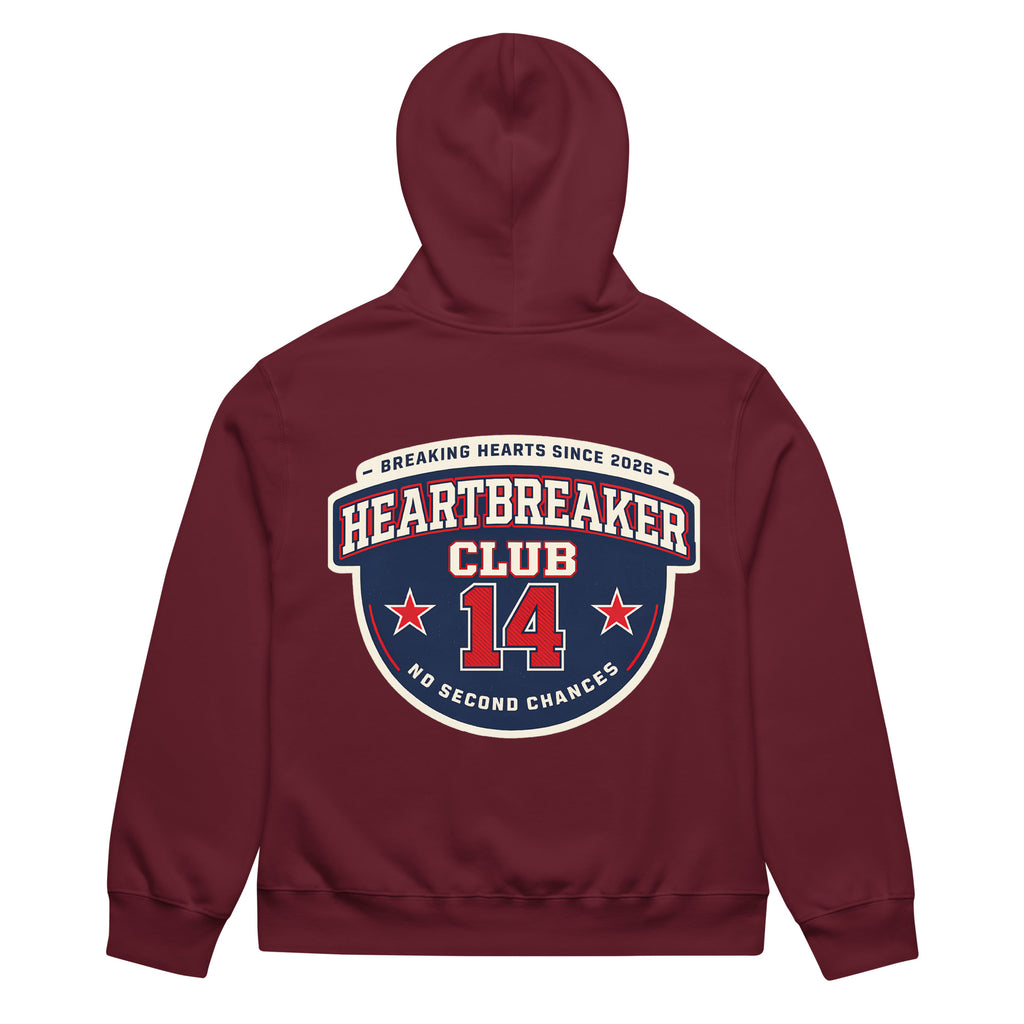 Maroon hoodie back view featuring large “Heartbreaker Club 14” varsity emblem with red stars and text “Breaking Hearts Since 2026 – No Second Chances” in red, navy, and cream.