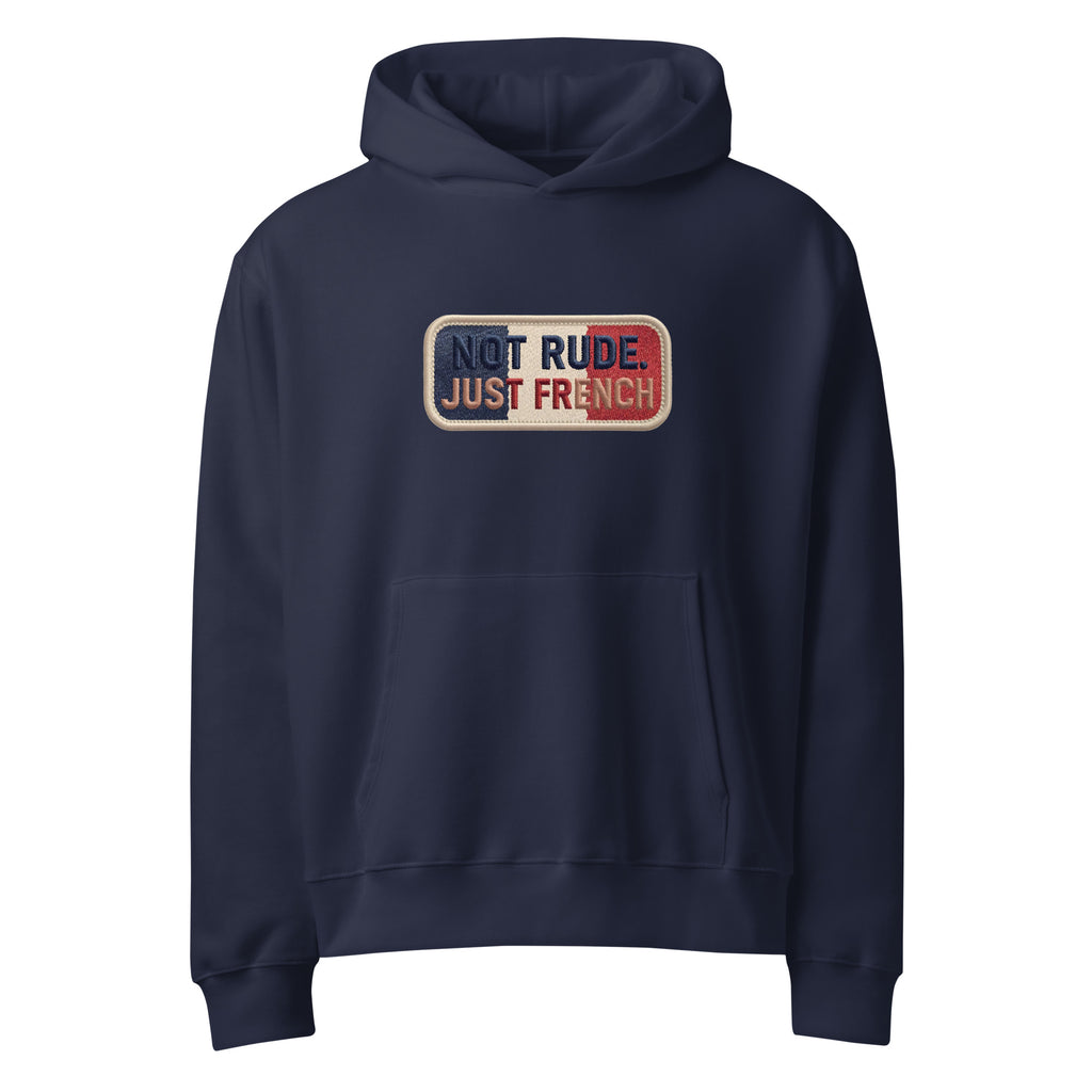 Navy oversized hoodie with “Not Rude Just French” statement patch, front view