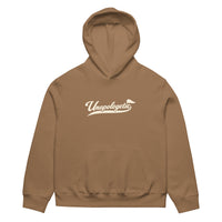 unisex streetwear hoodie front view with Unapologetic script logo
