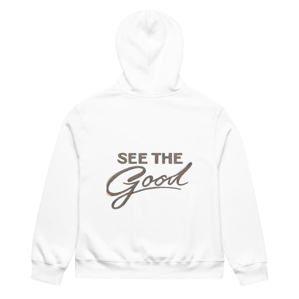 White unisex streetwear hoodie back view with “See The Good” motivational typography print
