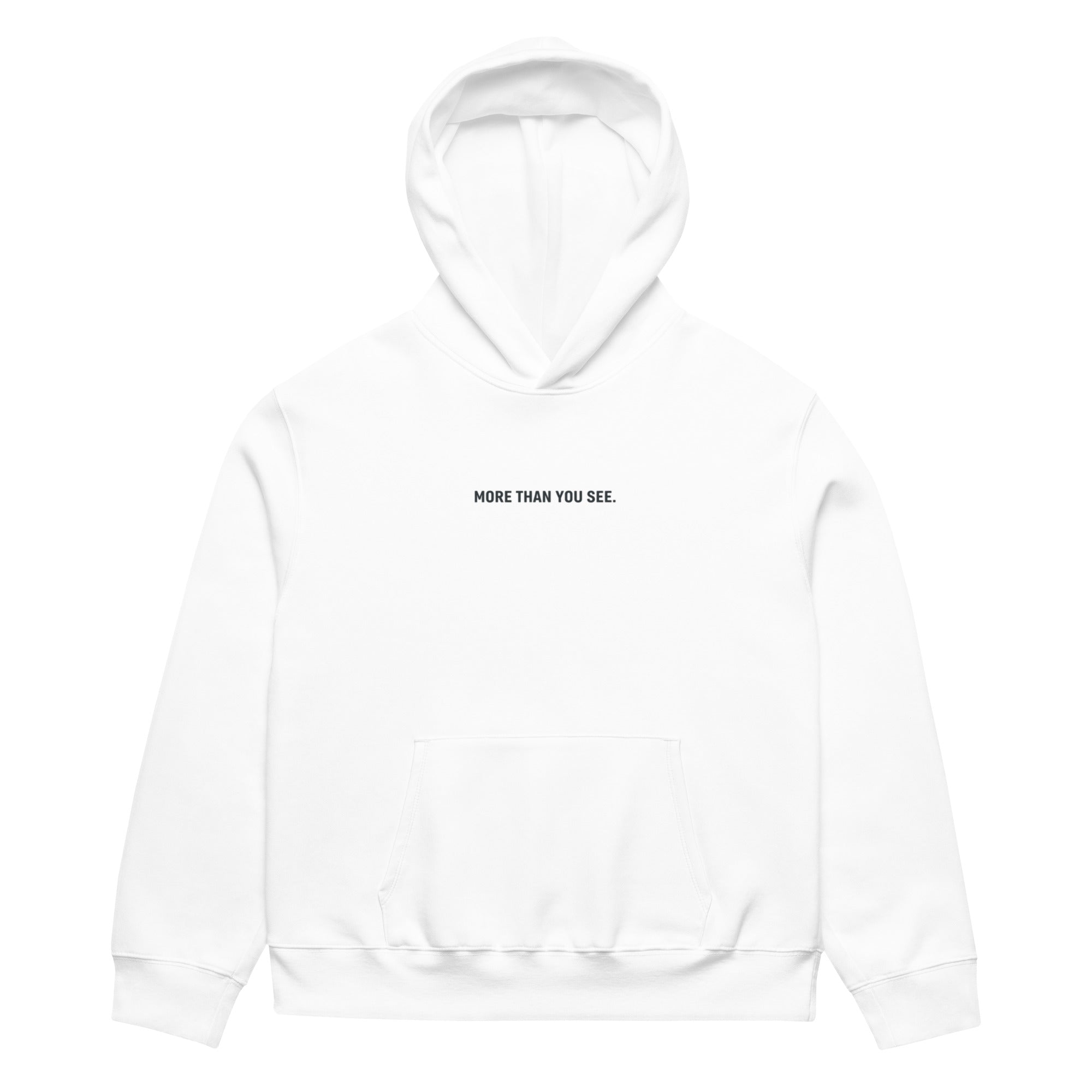White women’s oversized hoodie with “More Than You See” front slogan, modern women’s streetwear hoodie product photo for online store.