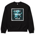 Oversized black streetwear crewneck sweatshirt with teal portrait graphic and soft face sharp mind typography design, front view