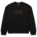 Black oversized heavyweight sweatshirt with “MORE Isn’t Always Better” statement print, unisex streetwear