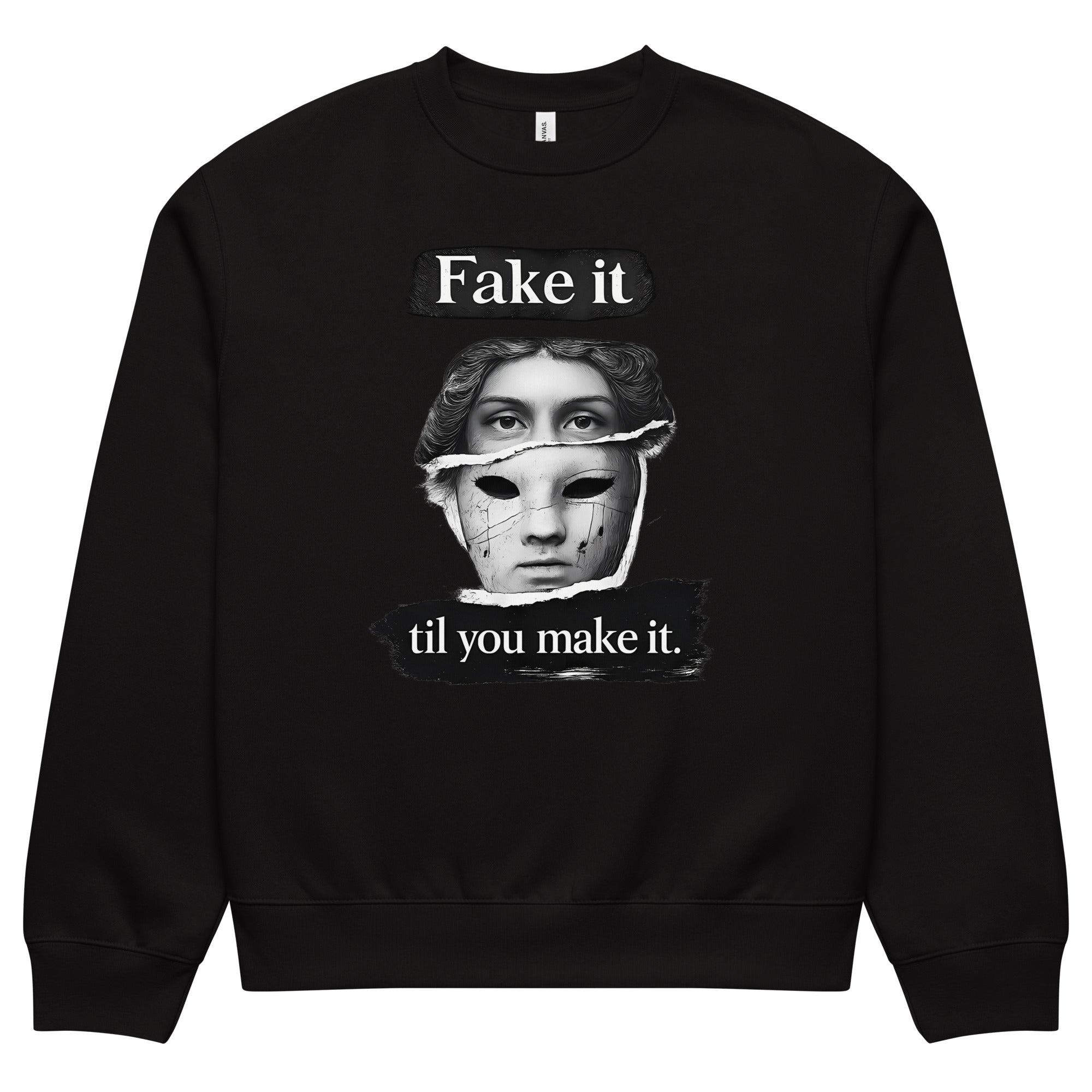 Black unisex sweatshirt front view with illustrated face graphic and “Fake it til you make it” slogan, modern streetwear crewneck