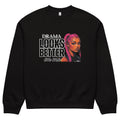 Black unisex sweatshirt front view with “Drama Looks Better on Me” bold streetwear graphic print