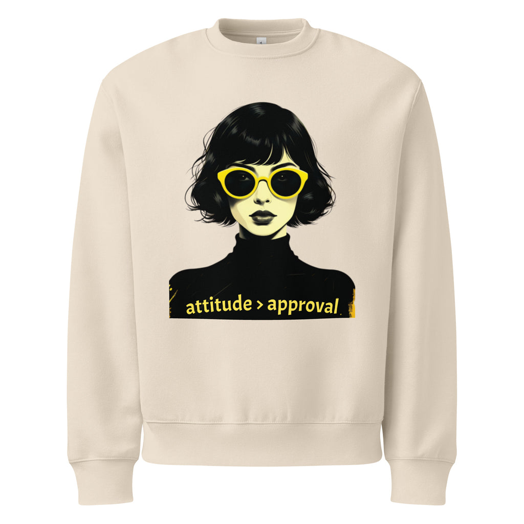 Beige unisex sweatshirt with illustrated female face and “attitude over approval” text design