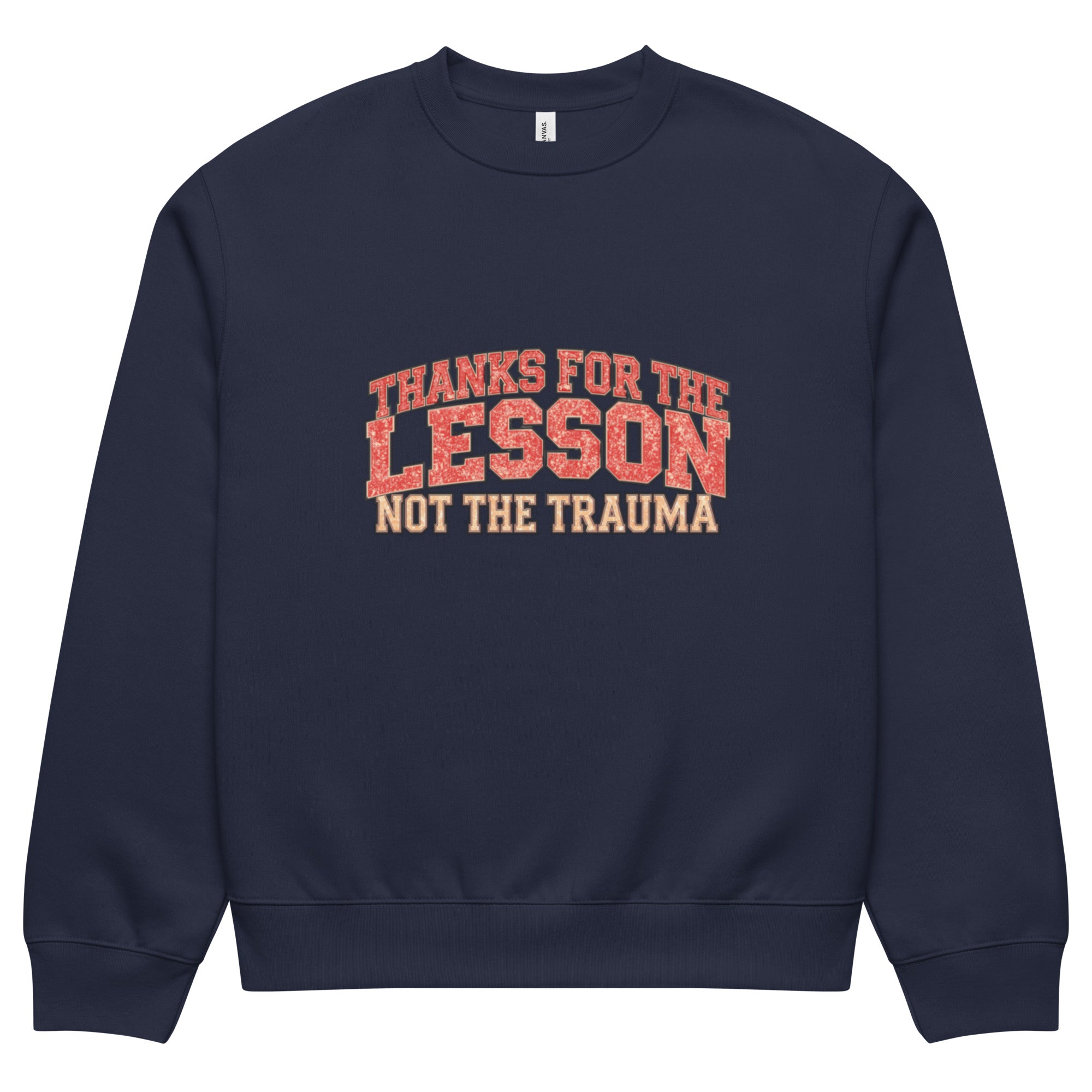Navy blue unisex sweatshirt front view with “Thanks for the Lesson, Not the Trauma” motivational typography print, modern streetwear pullover