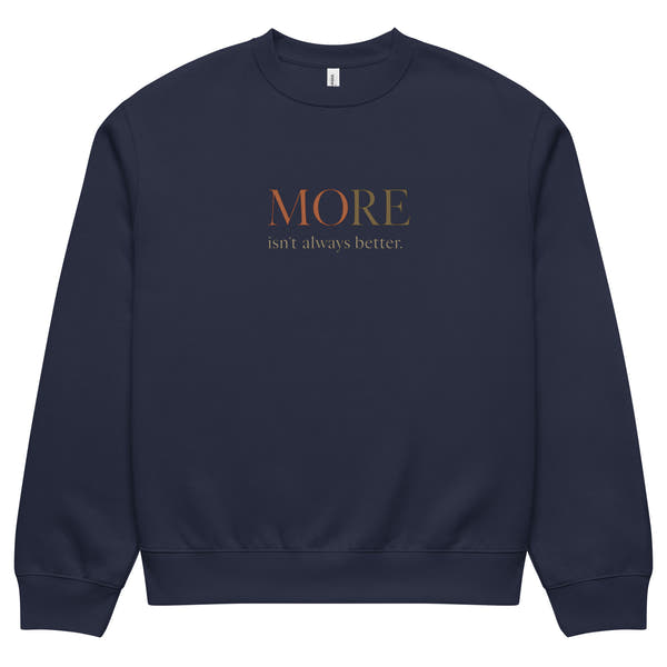 Navy oversized heavyweight sweatshirt with “MORE Isn’t Always Better” slogan, statement streetwear piece