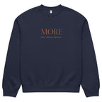 Navy oversized heavyweight sweatshirt with “MORE Isn’t Always Better” slogan, statement streetwear piece