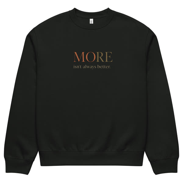 Vintage black oversized heavyweight sweatshirt with “MORE Isn’t Always Better” slogan, statement streetwear piece