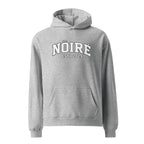 Heather gray Nöiré ESTB 2025 logo hoodie, front hanging view, urban streetwear outfit
