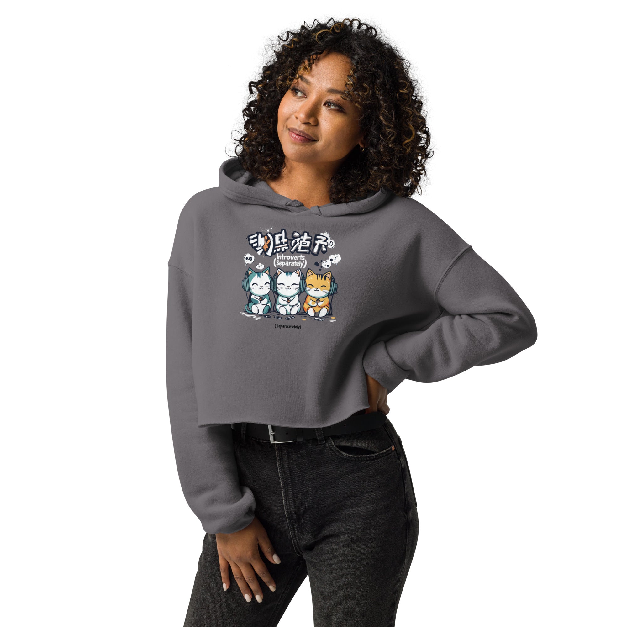 Woman wearing grey cropped streetwear hoodie with cute introvert cats cartoon graphic and introverts separately text, casual lifestyle outfit